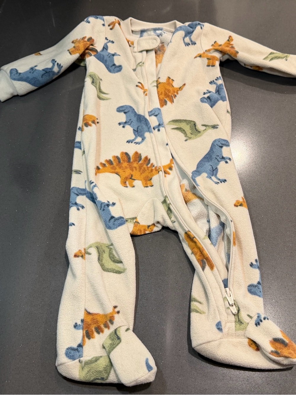 Carter's Cream Fleece One-Piece with Blue, Green, and Orange Dinosaurs